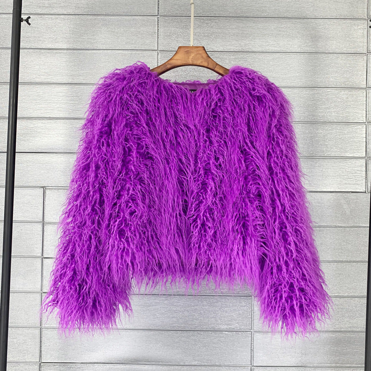 Trendy women's short fluffy jacket, super cozy and a colorful statement for fashion-forward looks.