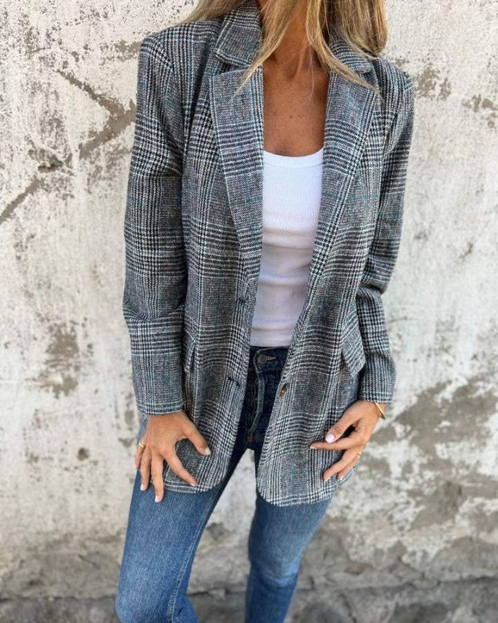 Stylish red checkered women's blazer, perfect for business casual and professional office outfits. Long sleeve tailored jacket.