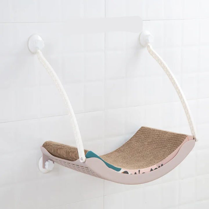 Sunbathing cat window hammock, providing warmth & a view for indoor cats from a cozy perch.
