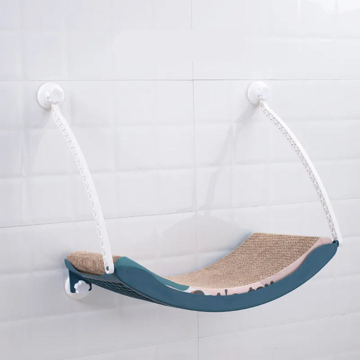 Cat window bed with strong suction cups, a cozy elevated perch & hammock for indoor cats.