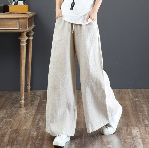 Stylish women's wide leg trousers with elastic waist, designed for comfortable everyday fashion.