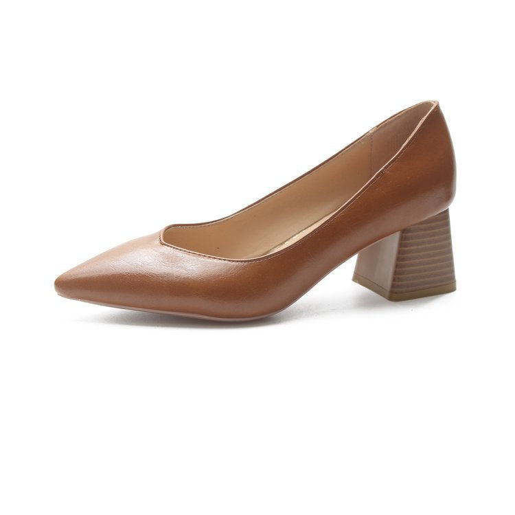 Women's elegant black block heel pumps, designed for all-day comfort & style. Classic pointed toe dress shoes.