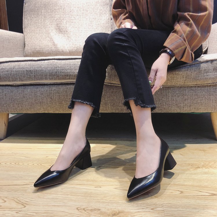 Comfortable women's black block heel pumps, elegant pointed toe design. Versatile classic for all-day office wear.