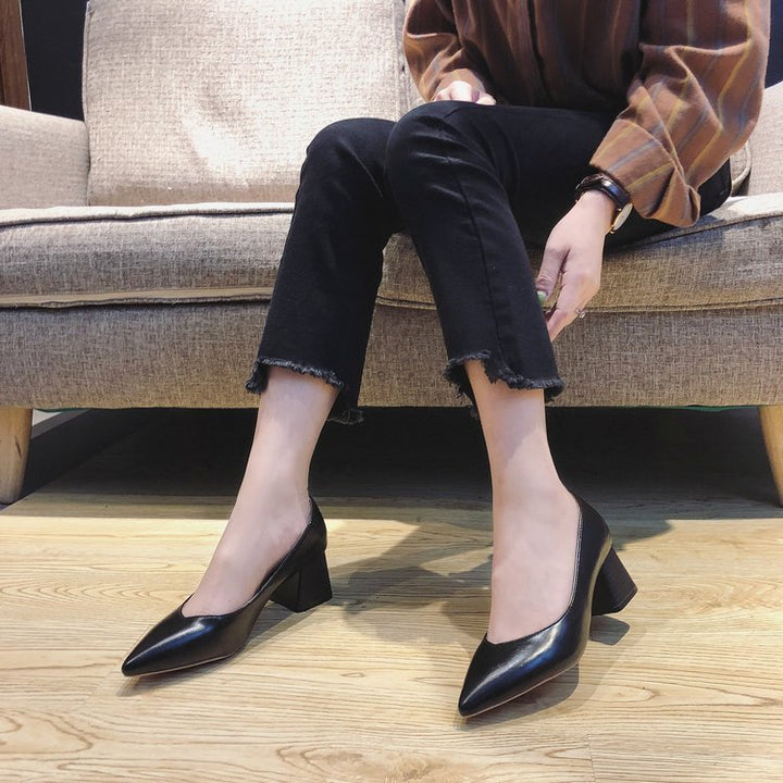 Comfortable women's black block heel pumps, elegant pointed toe design. Versatile classic for all-day office wear.