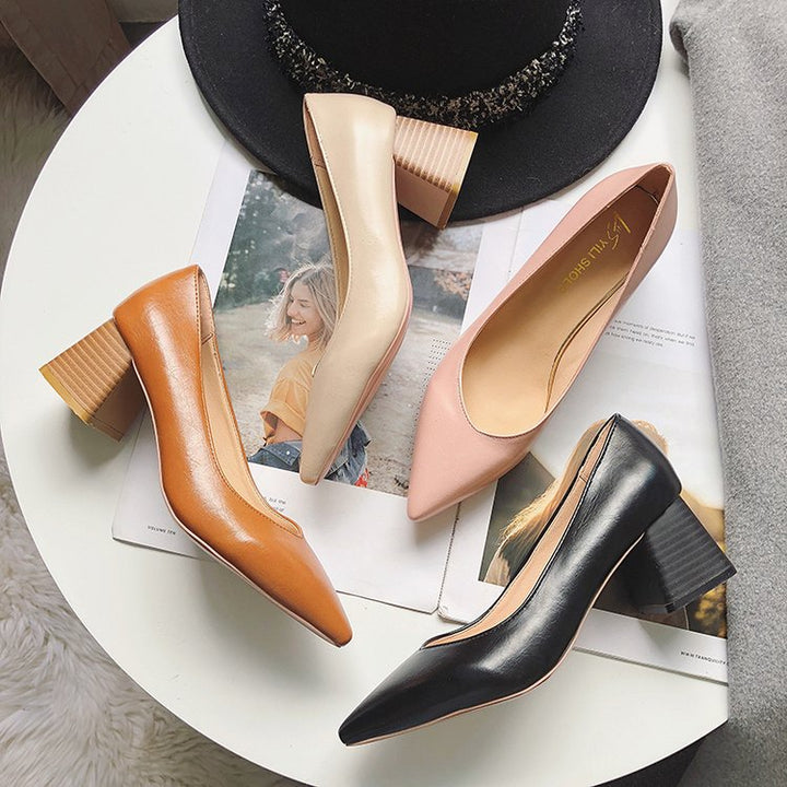 Elegant women's black block heel pumps with pointed toe, perfect for office wear & formal occasions. Comfortable dress shoes.
