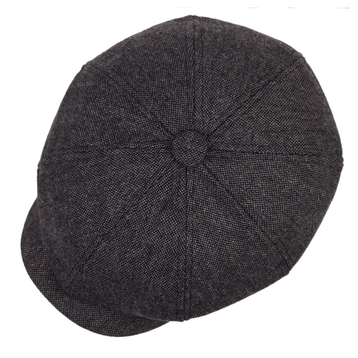 Retro men's flat cap, herringbone pattern, classic vintage fashion statement headwear.