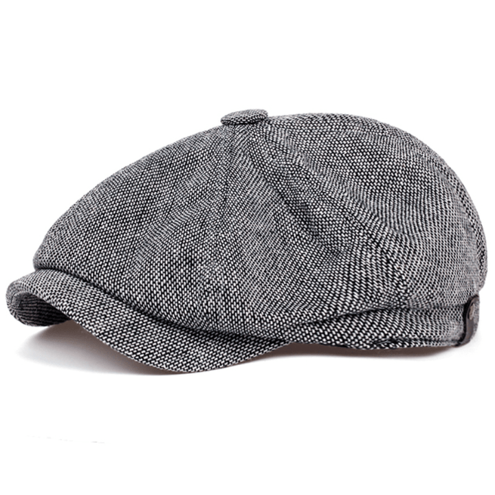 Stylish men's vintage flat cap with herringbone texture, perfect retro fashion headwear.