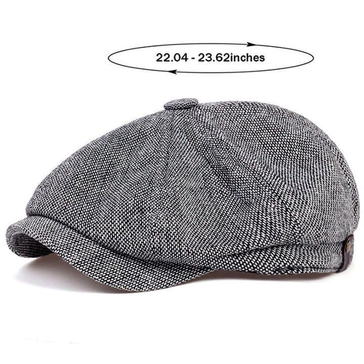 Close-up of men's herringbone flat cap texture, classic retro vintage look.