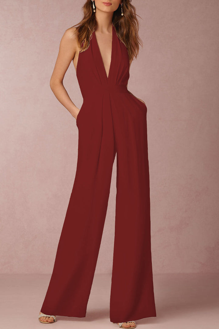 Elegant solid pleated V-neck jumpsuit for women. Sleeveless & backless. A stylish choice for formal evening wear & special events.