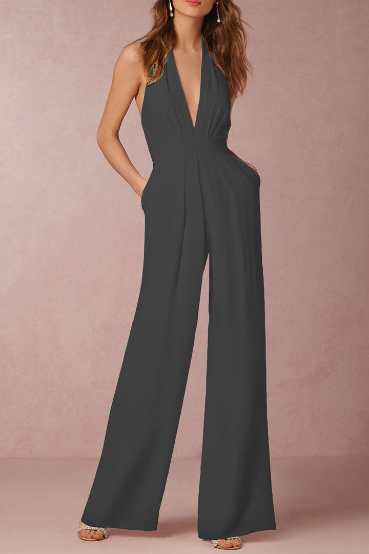 Stylish solid color V-neck jumpsuit for women. Sleeveless & backless design, elegant. Perfect for evening wear & formal parties.