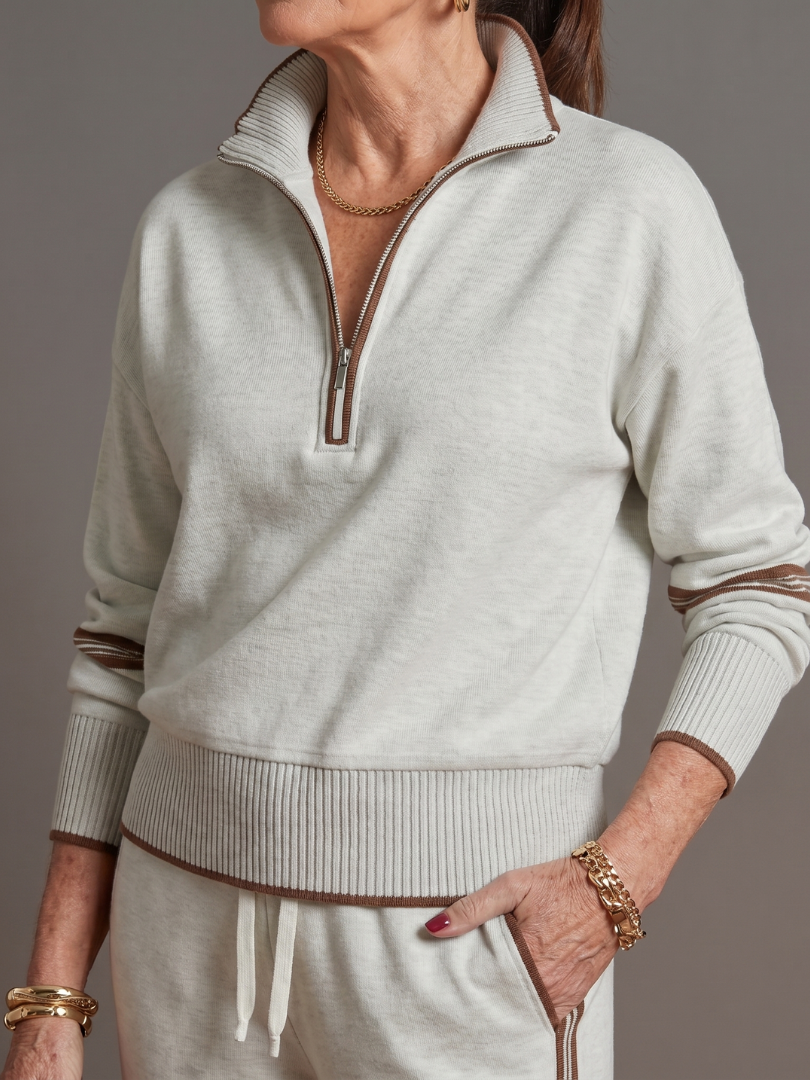 Comfortable women's casual outfit with a zip neck long sleeve top & relaxed wide leg pants.