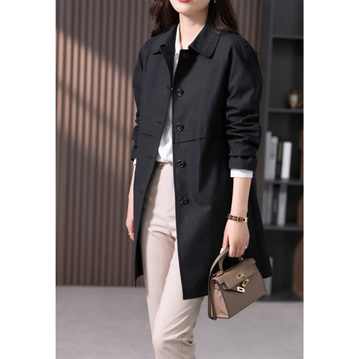 Women's versatile long trench coat, a classic and elegant outerwear piece with a tie waist.