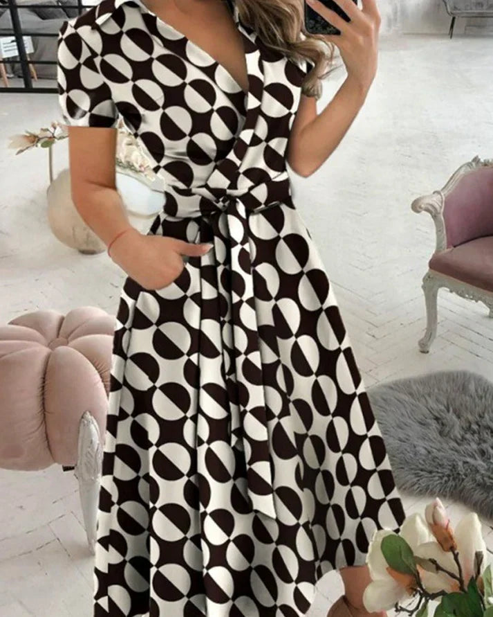 Stylish & comfortable women's V-neck midi dress. An elegant choice for sophisticated occasion wear & versatile fashion.