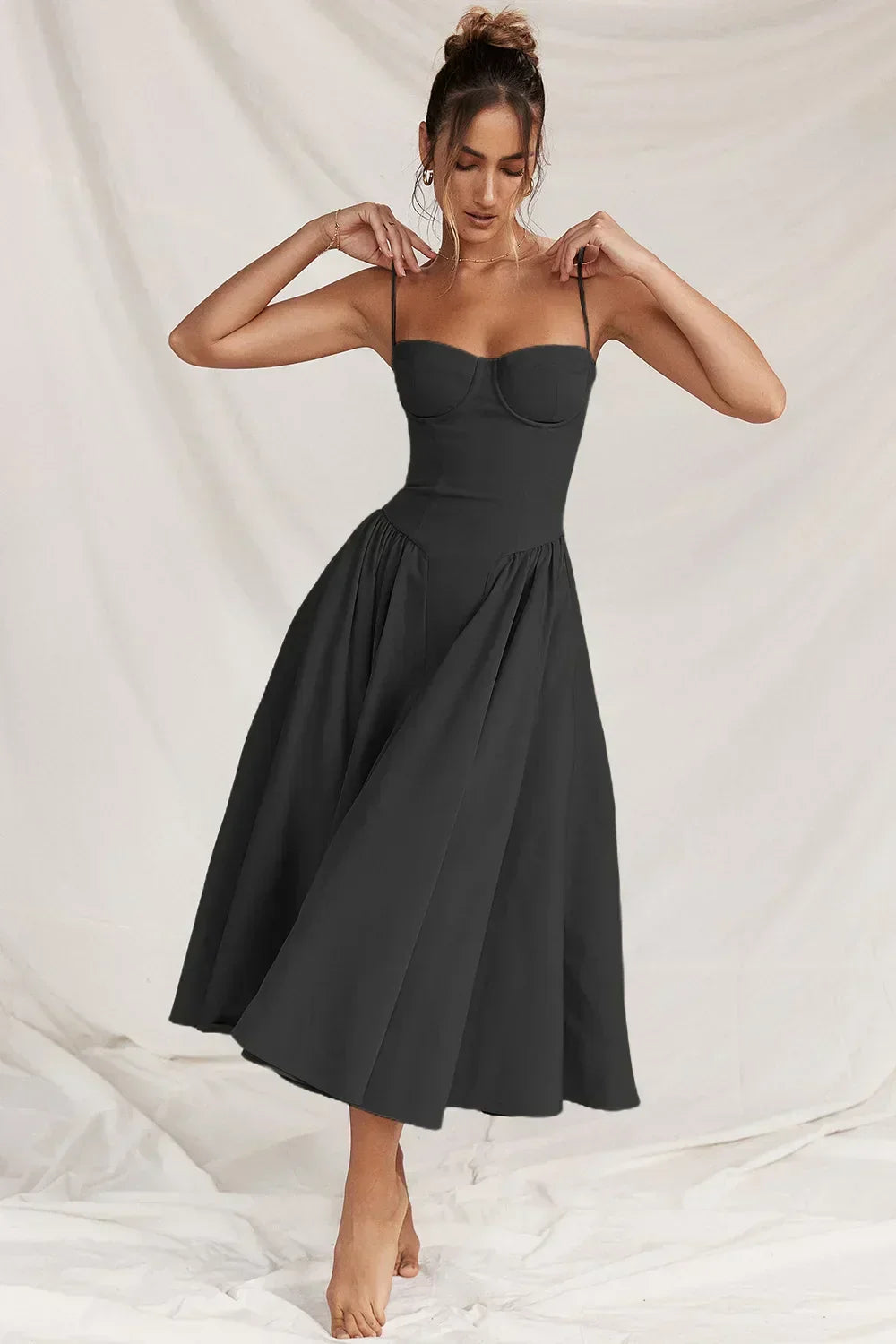 Women's formal midi dress with an elegant sleeveless design & structured corset. Perfect evening attire.