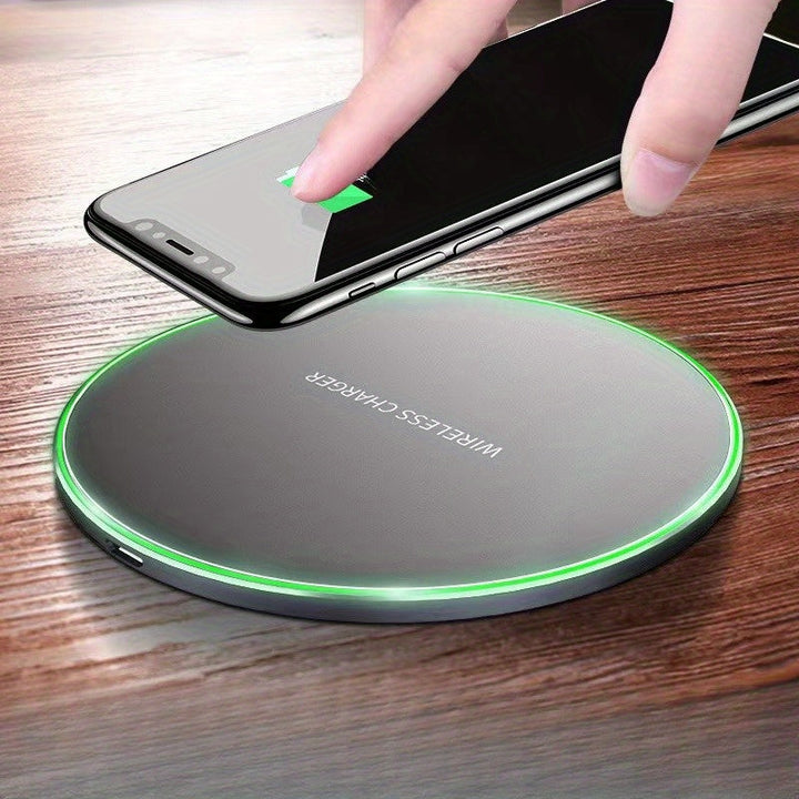 Fast Wireless Charger for iPhone & Android. Sleek black charging pad offers cable-free, quick smartphone power.