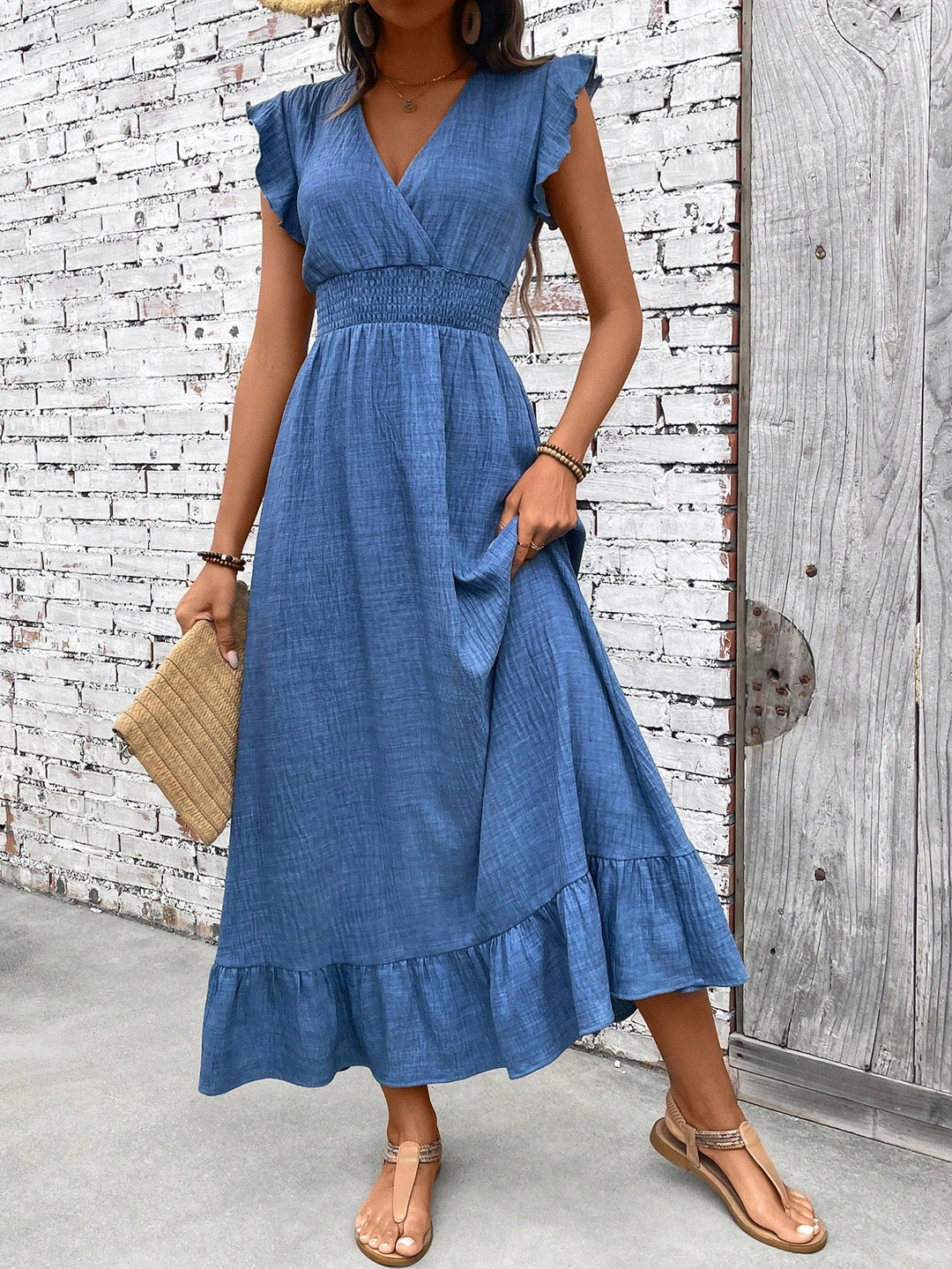 Women's boho maxi summer dress with a smocked waist, featuring a flowy, bohemian style for casual wear.