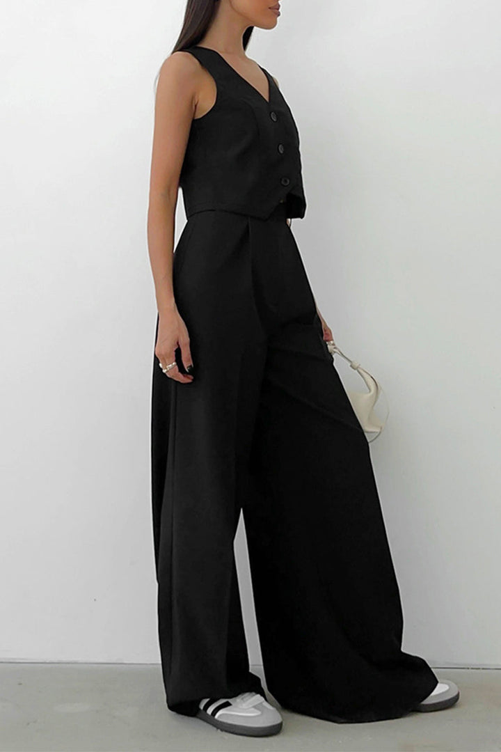 Versatile women's elegant outfit: a smart waistcoat and stylish wide leg pants. Perfect two-piece set.