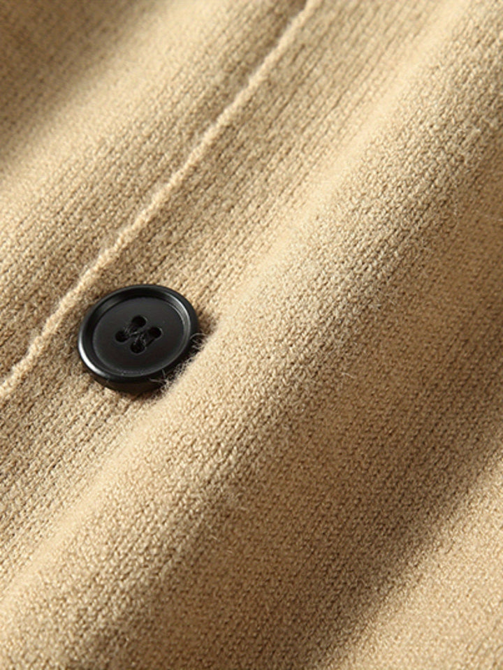 Men's handcrafted button cardigan. Regular fit, long sleeve sweater for timeless, comfortable style.