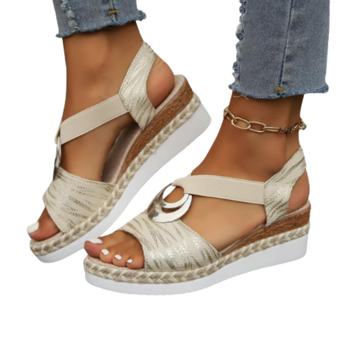 Cushioned women's wedge sandals with supportive footbed, perfect for casual summer walking & style.