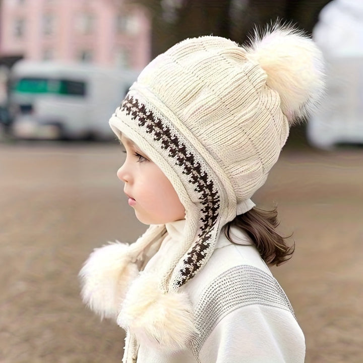 Children's warm ear flap hat with double pom-poms, ideal for toddlers and kids during cold weather.