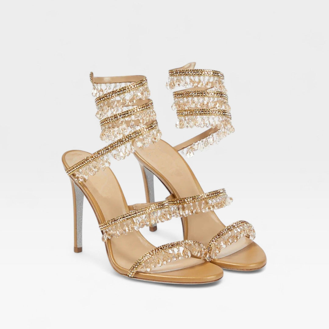 Luxurious sparkling crystal high heels, strappy design for women's evening elegance.