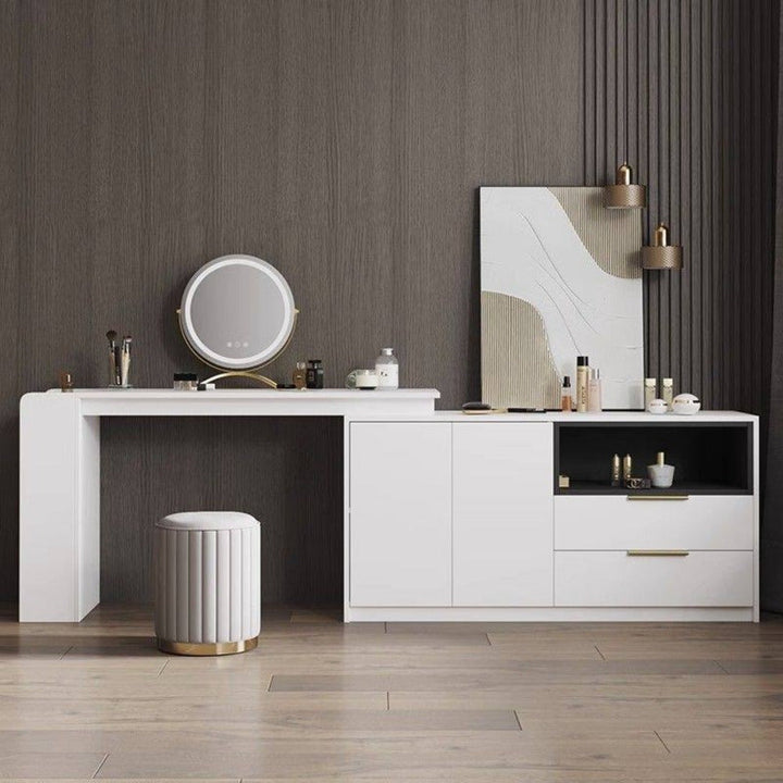 Round storage ottoman with mirror finish, perfect for modern living rooms.