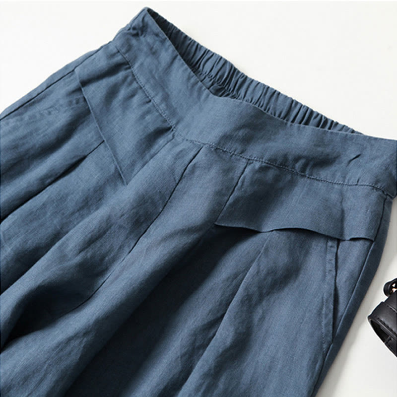 High-rise wide-leg trousers, a key piece for modern women's fashion.