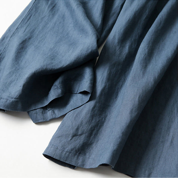 Pleated wide-leg pants for an elegant and comfortable business casual outfit.