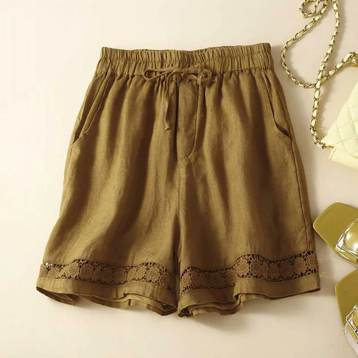 Comfortable ladies relaxed fit shorts featuring an elastic waist, practical pockets, and stylish design for summer.