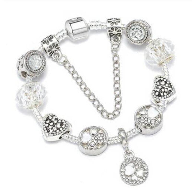 Versatile women's peach blossom charm bracelet; colorful floral wristband, perfect elegant accessory.