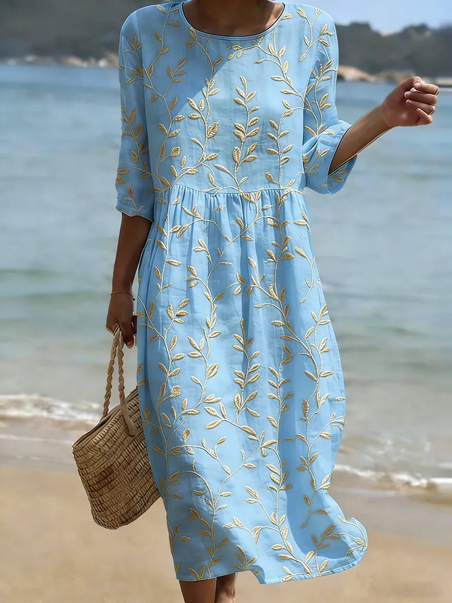 Elegant women's midi dress with vibrant plant & flower print, round neck. Perfect for summer/spring, versatile & comfortable.