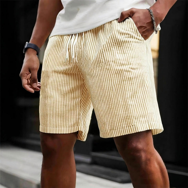Versatile men's striped drawstring shorts. Perfect for casual weekend attire & streetwear comfort.