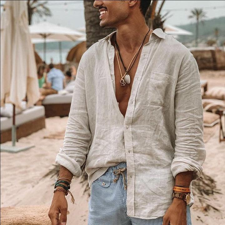 Man wearing a stylish casual button-up long sleeve shirt. Relaxed fit, perfect for everyday men's fashion.