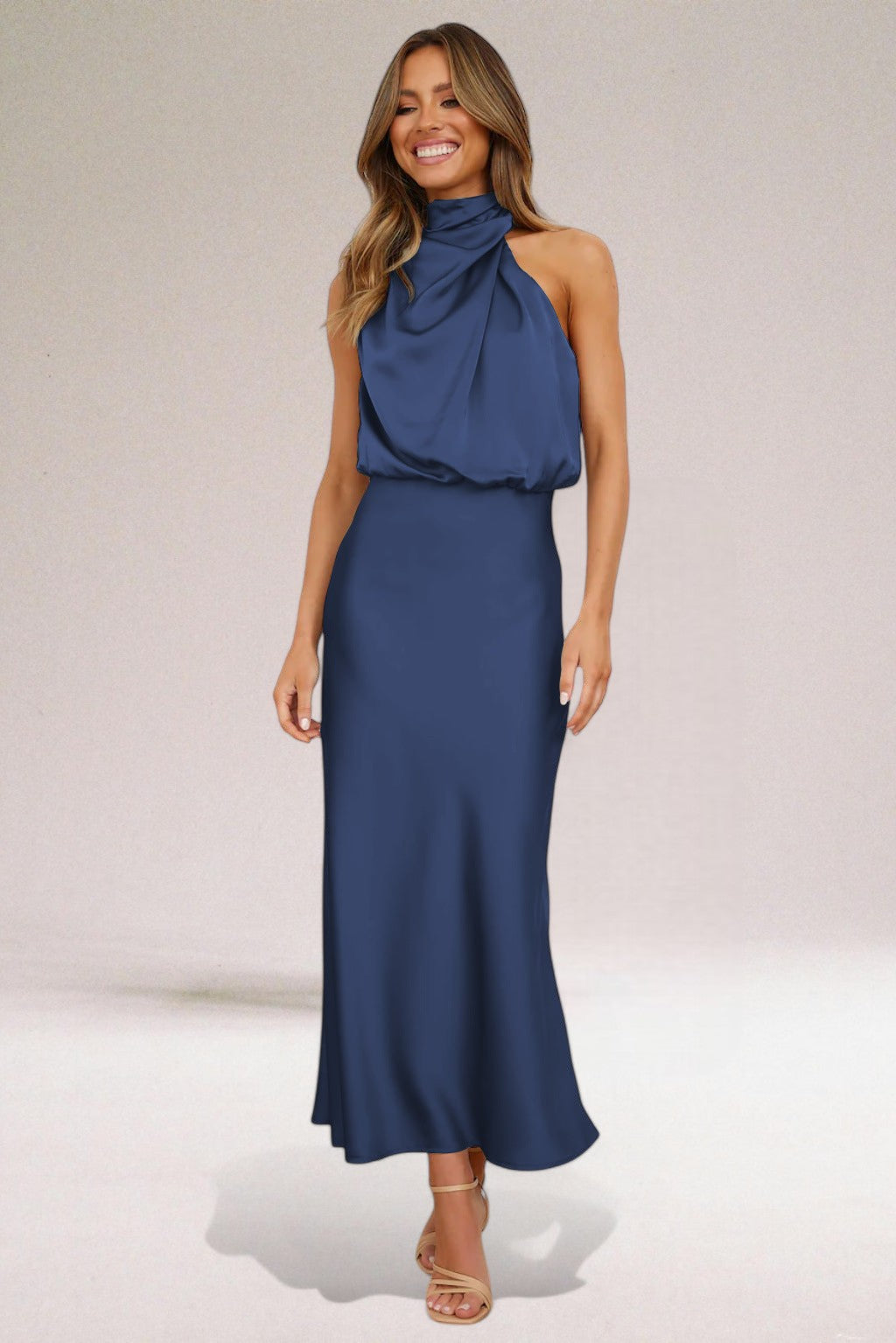 Chic women's halter neck maxi dress, an elegant choice for parties and formal evening wear.