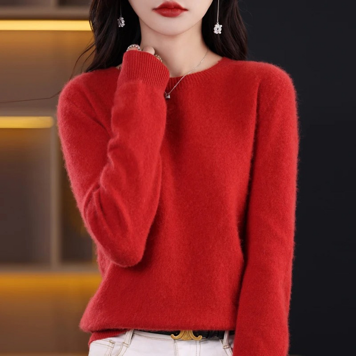 Elegant women's soft knit sweater, a warm round neck pullover perfect for comfortable winter luxury.