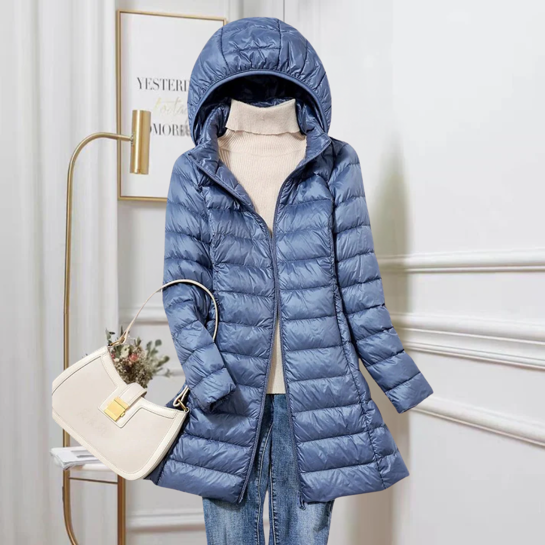 Women's ultra-light puffer jacket, packable & cozy for travel. Ideal autumn/winter outerwear.