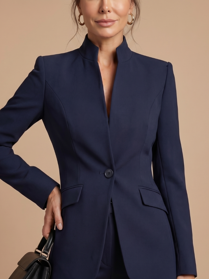 Stylish women's tailored suit, stand collar top & flared bottom, ideal for professional settings.