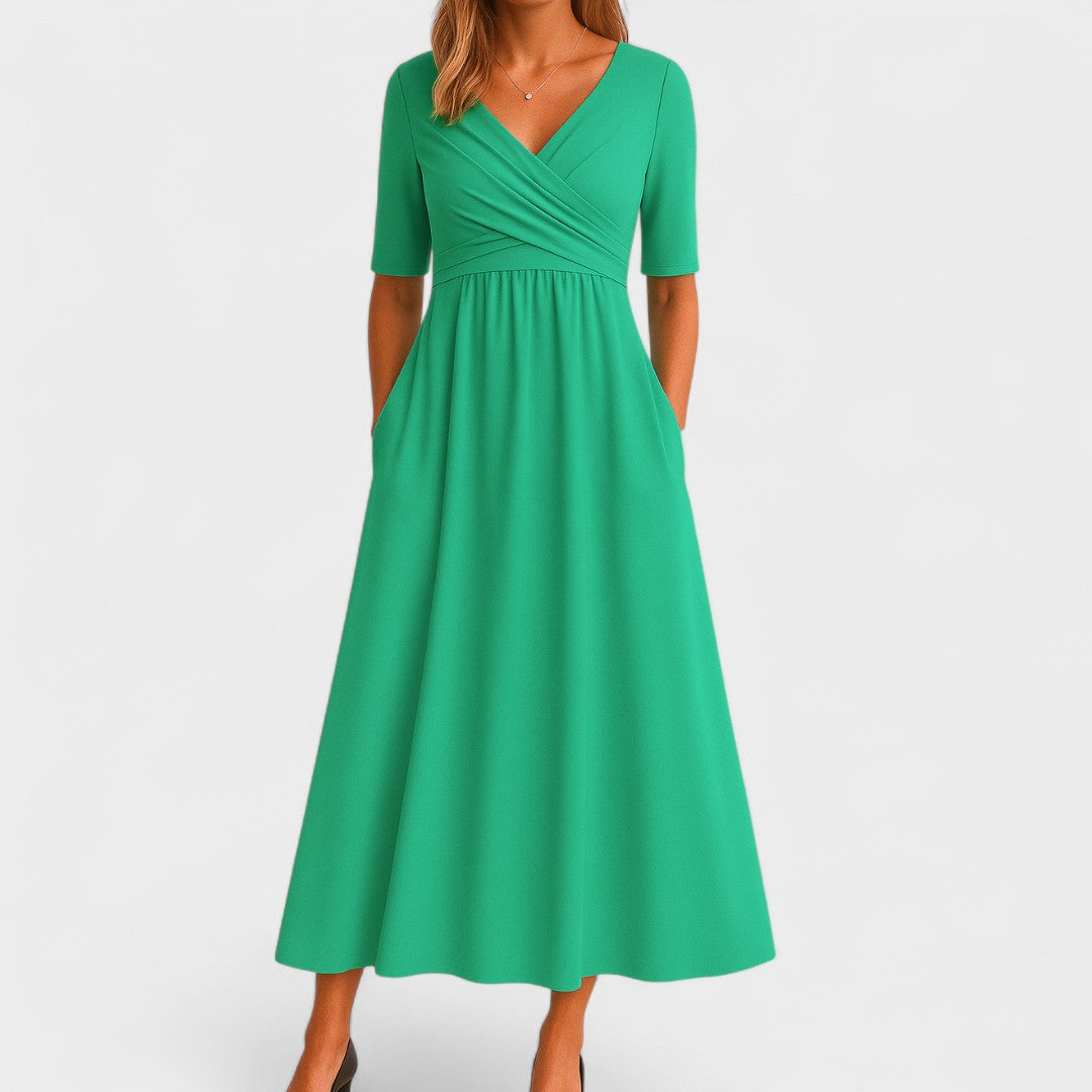 Elegant women's casual V-neck midi dress, offering comfort and style with useful hidden pockets.