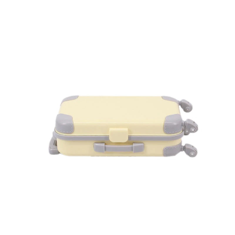 Must-have 18-inch doll accessory: a travel suitcase toy luggage for kids' imaginative play trips.