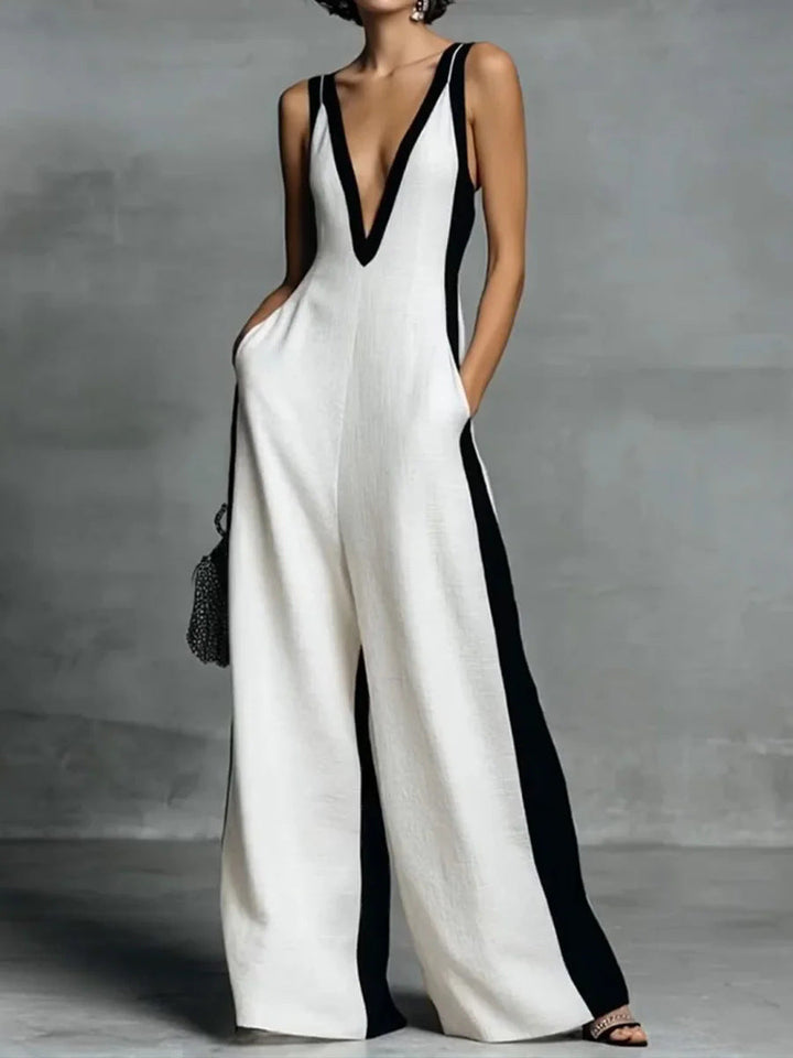 Women's elegant black & white color-block wide-leg jumpsuit, a chic sleeveless V-neck one-piece.