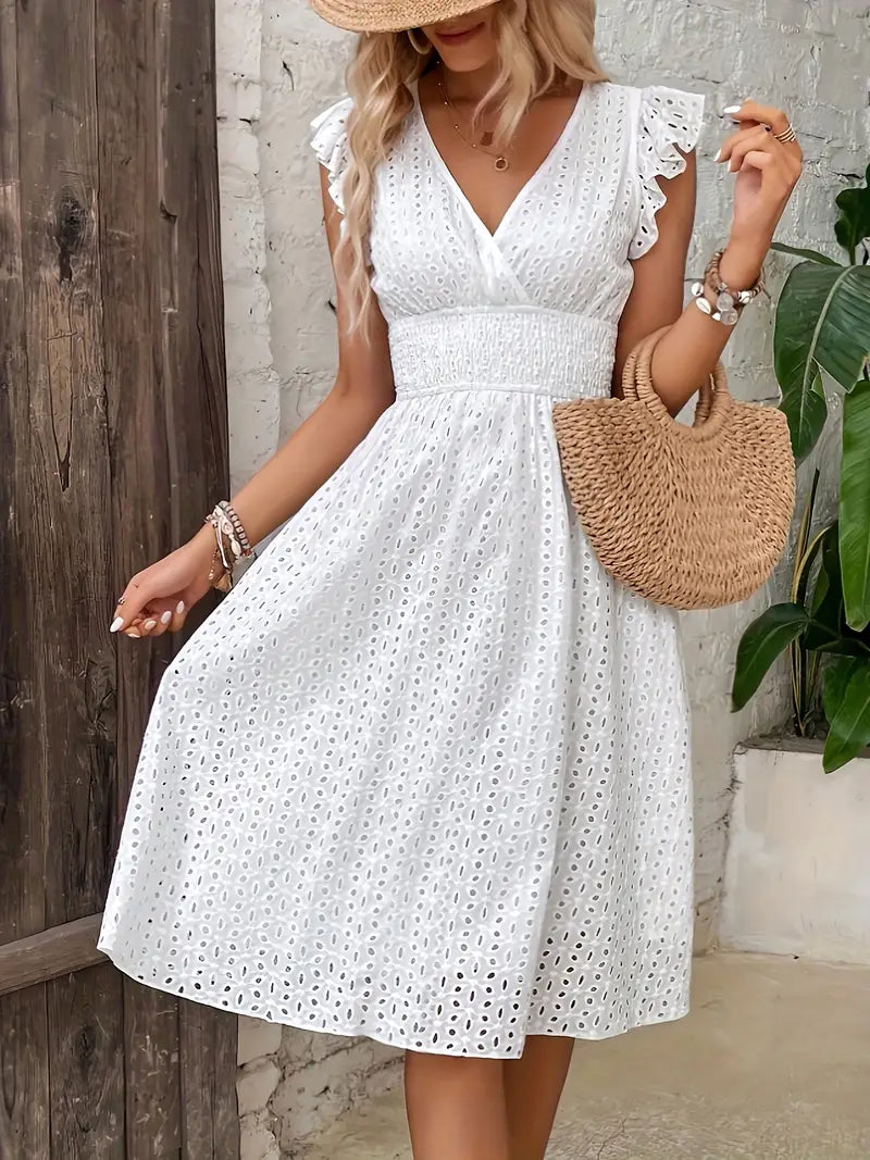 Flowy, comfortable women's summer dress, perfect for beachwear, vacations, and relaxed spring days.