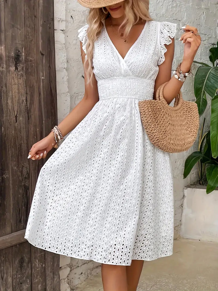 Flowy, comfortable women's summer dress, perfect for beachwear, vacations, and relaxed spring days.