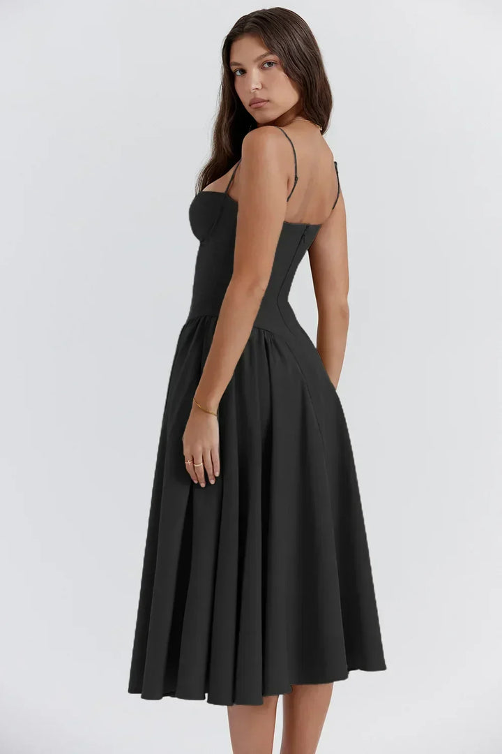 Sleeveless elegant midi dress for women, featuring a flattering corset. Ideal for sophisticated parties.