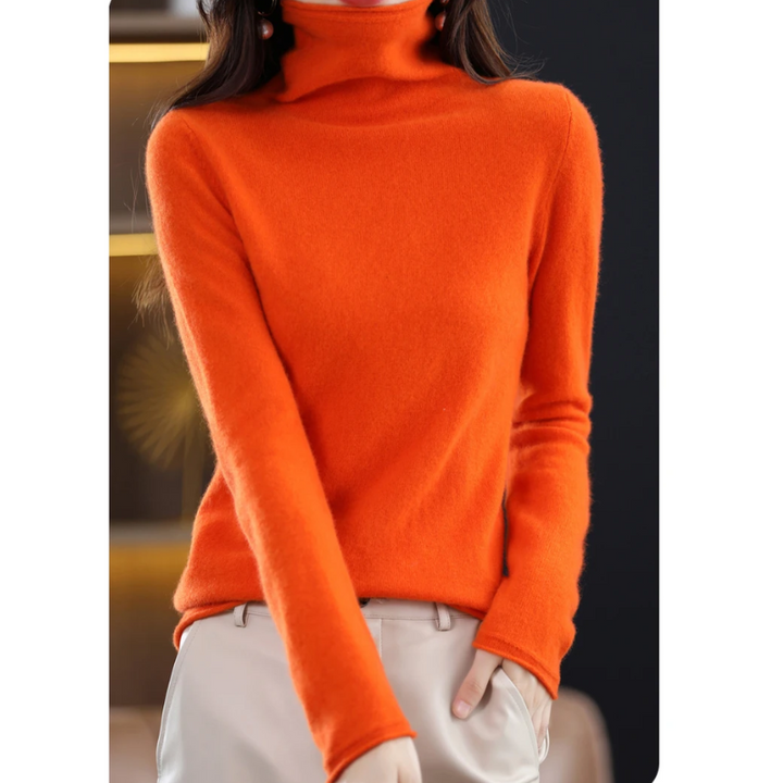 Women's cozy roll neck top. Soft, warm long sleeve sweater, perfect for chilly days.
