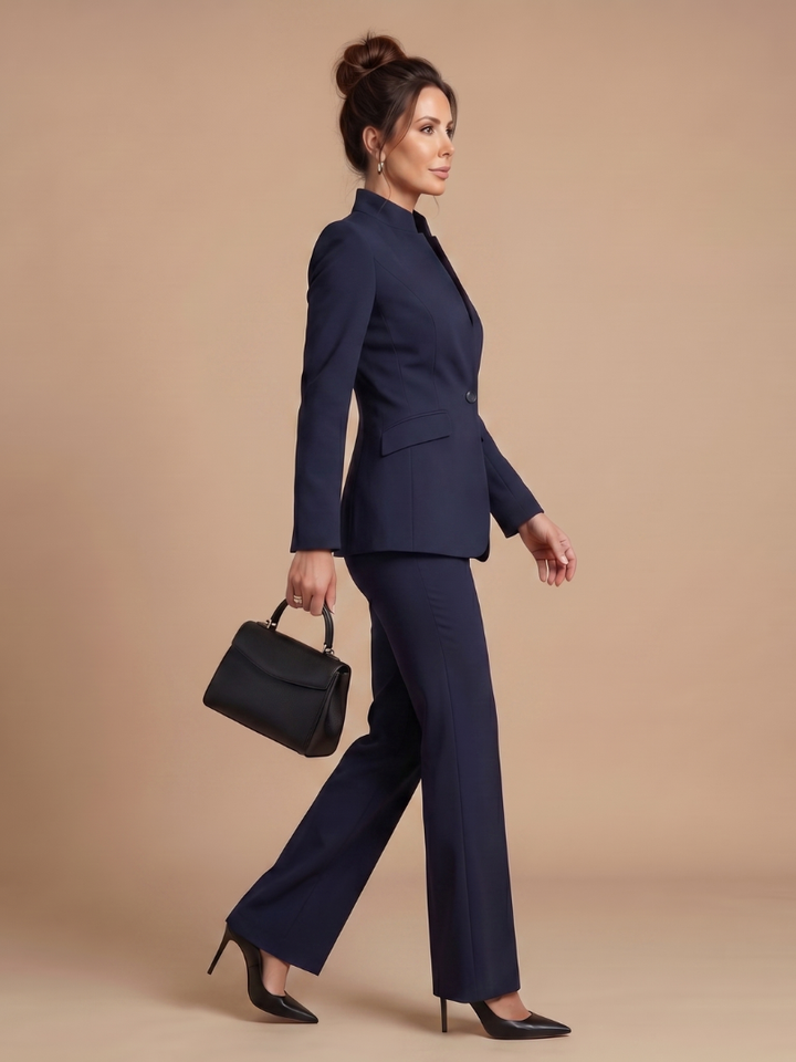 Modern women's formal suit: structured stand collar jacket and elegant flared tailored trousers.