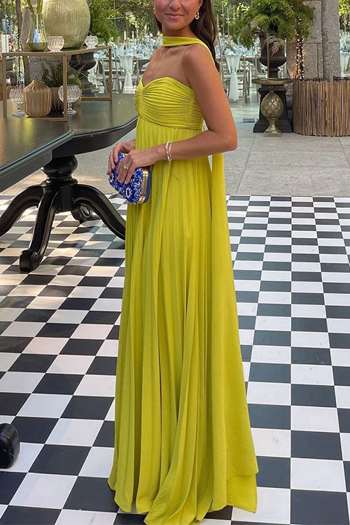 Yellow off-shoulder pleated maxi dress for women, designed with elegant lacing. Ideal as a summer or evening dress.