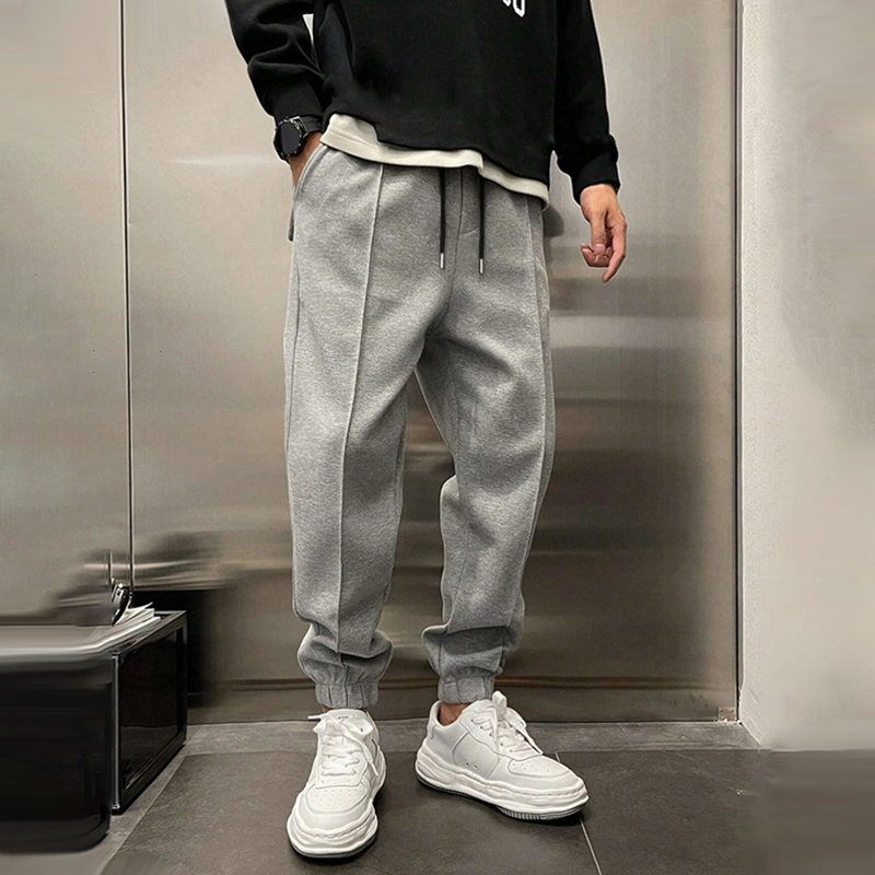 Stylish men's relaxed fit pants, offering comfort and a modern look for smart casual outfits.