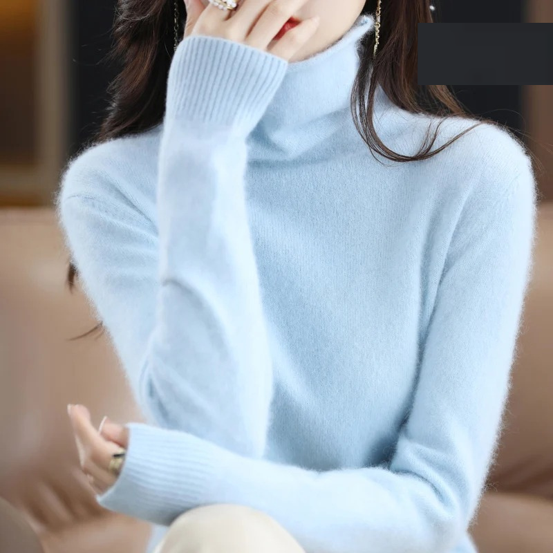 Elegant women's warm turtleneck sweater, chic long sleeve knit for luxurious comfort.