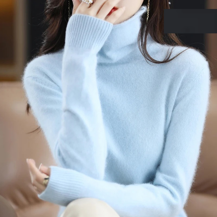 Elegant women's warm turtleneck sweater, chic long sleeve knit for luxurious comfort.