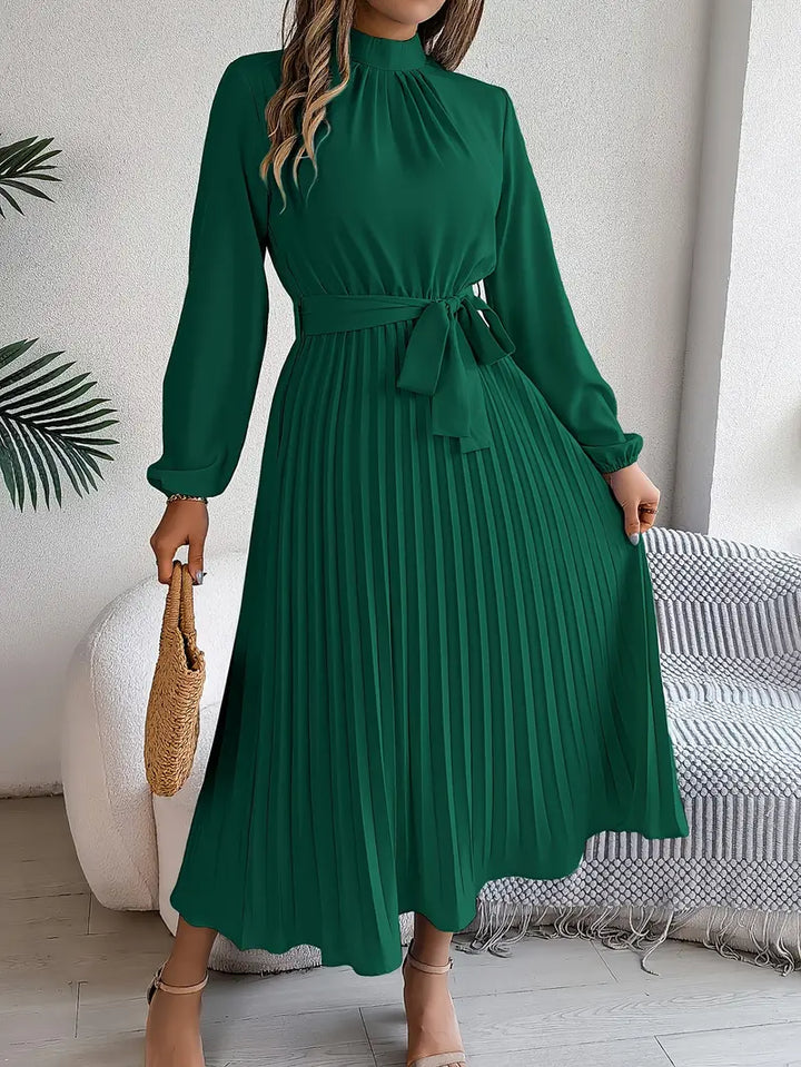 Modest long-sleeve midi dress with belt, an elegant choice for women's fashion.